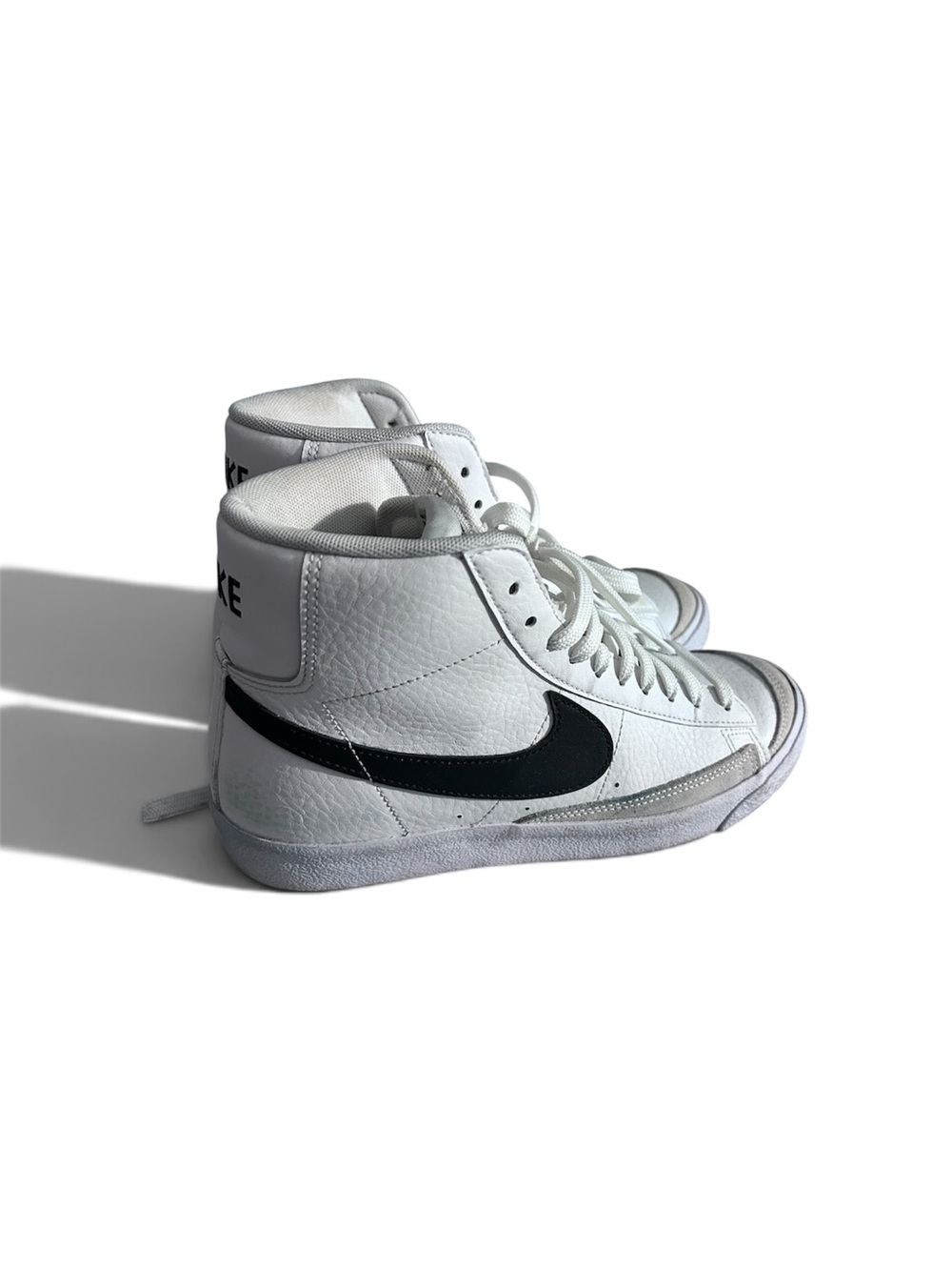 Nike White High-Top Kids Sneakers with Black Swoosh